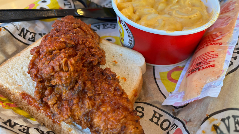 Dave's hot chicken on bread with macaroni and cheese