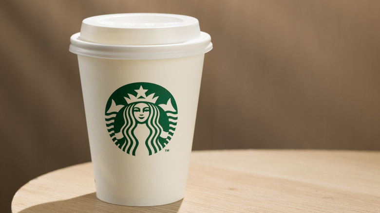 starbucks cup on table