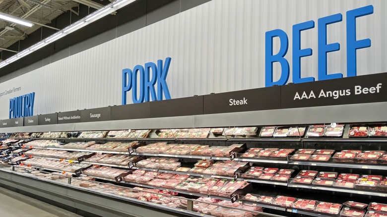 Walmart meat display with beef, poultry, and pork