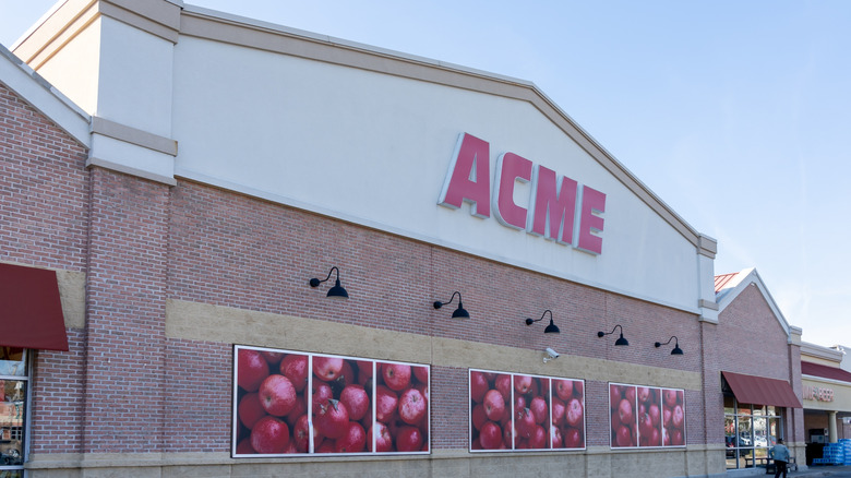 brick building with Acme logo in red across