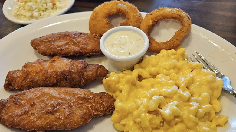 A Bob Evans Fish Fry Platter with sides of Onion Rings and Mac & Cheese.