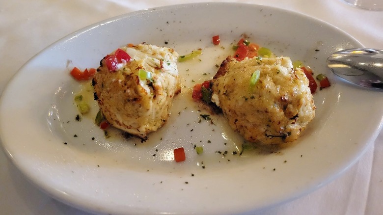 Two Ruth's Chris Steak House Crab Cakes on a plate.
