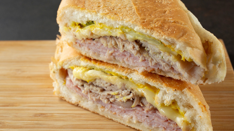 A closeup of a Cuban sandwich cut in half