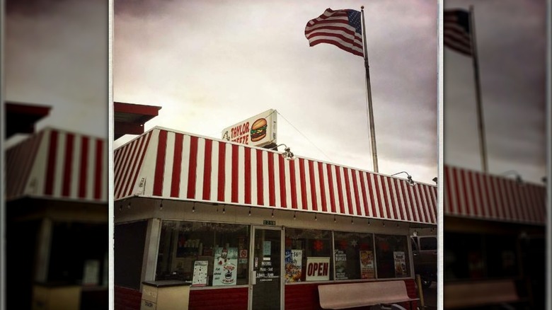 Exterior of Pima Taylor Freeze with red and white checkered awning