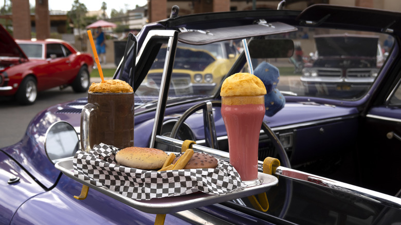 Window tray on car at drive-in restaurant