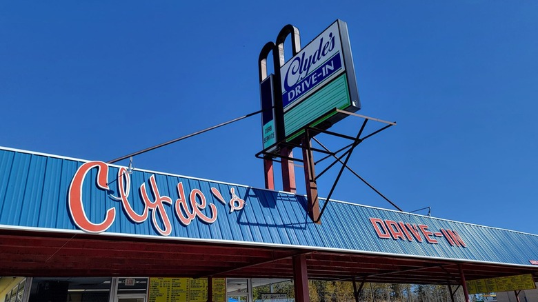 Clyde's Drive-In sign and front entrance on bright blue sky day