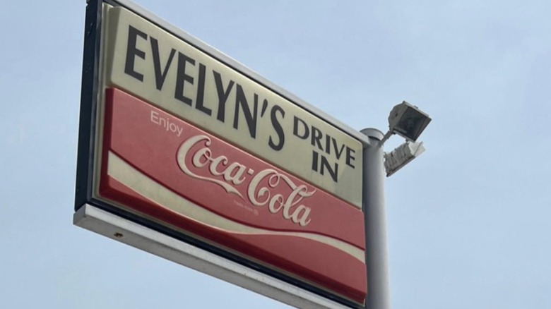 Evelyn's Drive In sign with coca-cola label