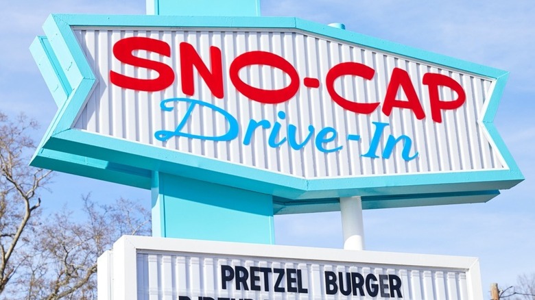 Sno-Cap Drive-In Retro Sign against cloudy blue sky