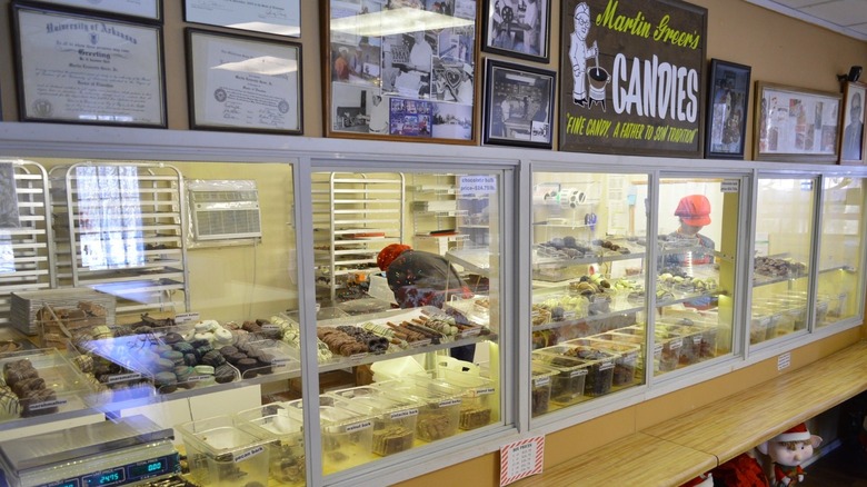 Candy display with kitchen in background at Martin Greer's Candies