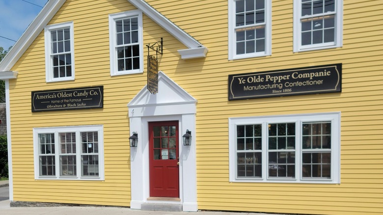 Yellow storefront of Ye Olde Pepper Companie
