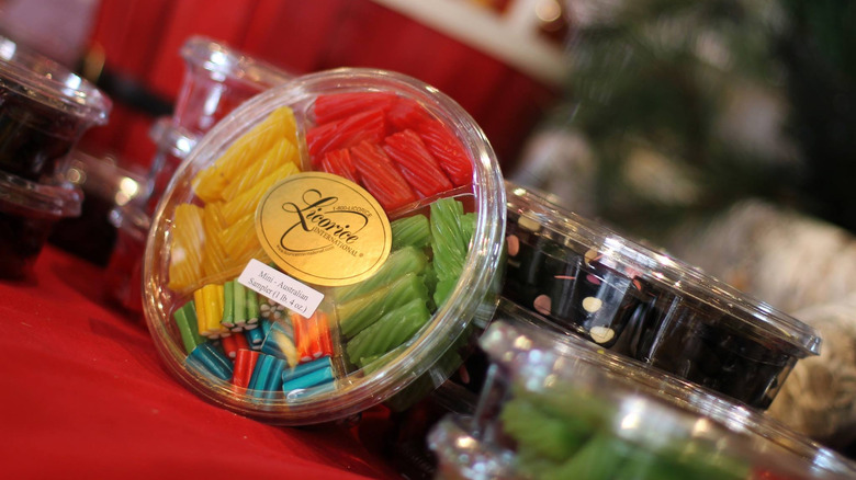 Licorice International candies in box displayed on red tablecloth