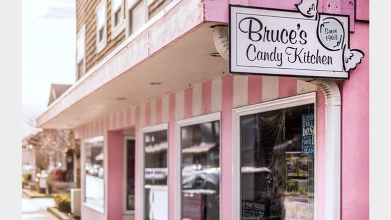 Bruce's Candy Kitchen storefront with pink and white striped walls
