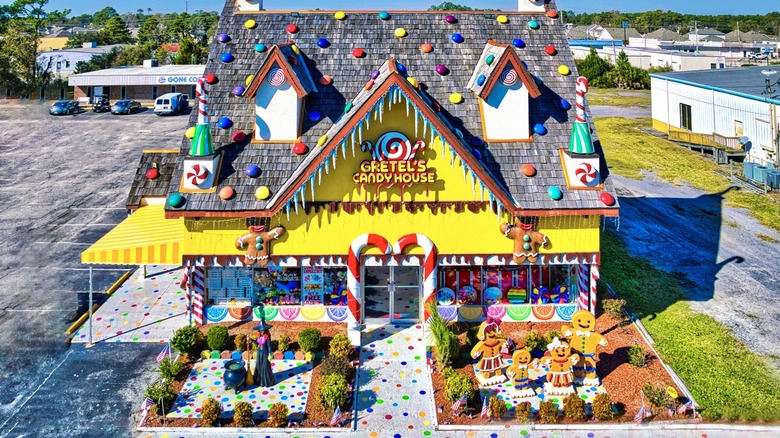 Gretel's Candy House with bright yellow exterior and candy-esque trim