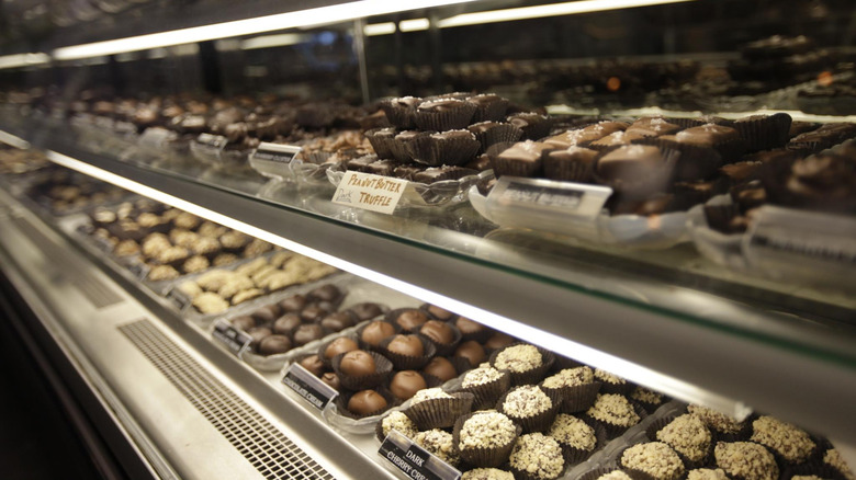 Chocolate fridge display filled with truffles at Hatch Family Chocolates