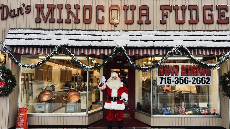 Dan's Minocqua Fudge storefront with Santa and holiday decor