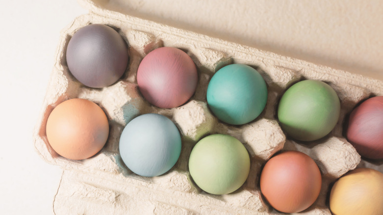 A carton of easter eggs dyed in light pastel colors