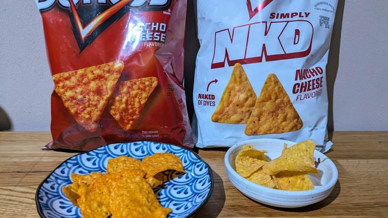 nacho cheese doritos next to simply nkd nacho cheese doritos