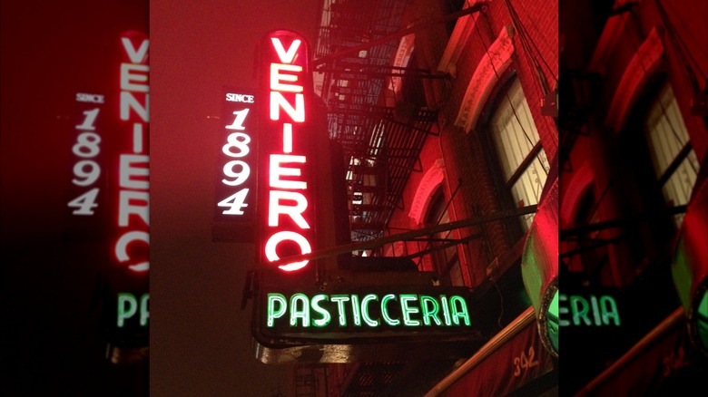 Neon Veniero Pasticceria sign light up at night
