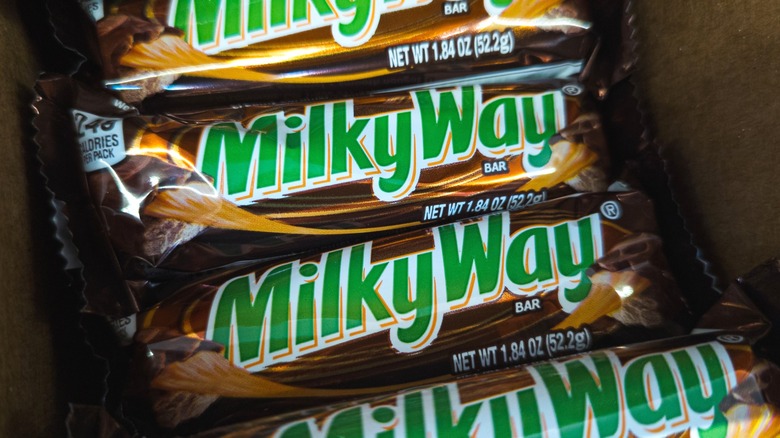 Milky Way bars piled in a cardboard box