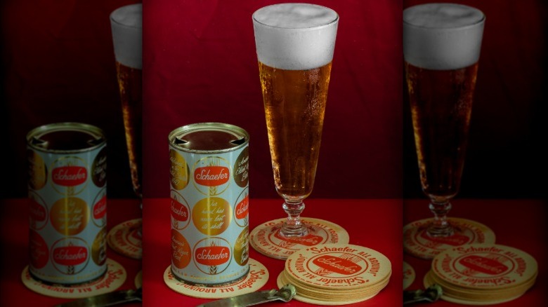 Can and tall glass of Schaefer beer with coasters