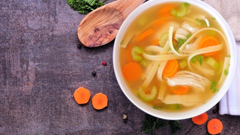 A bowl of chicken noodle soup.
