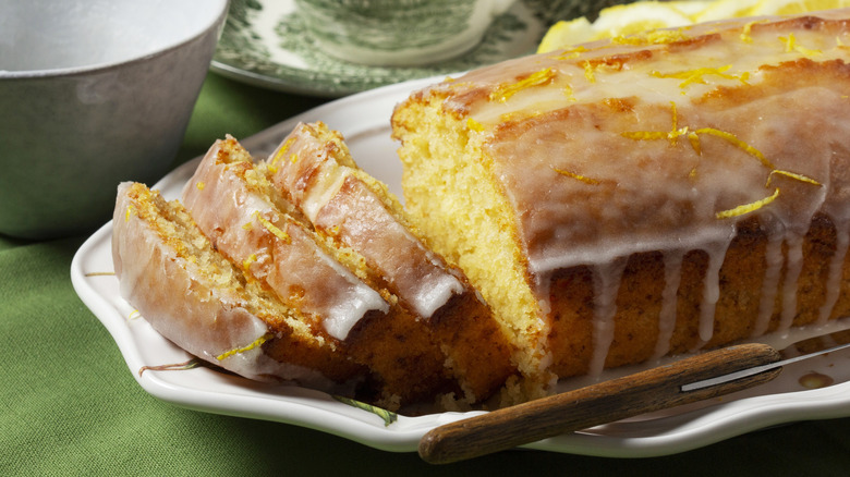 vintage-style loaf cake with frosting on a table