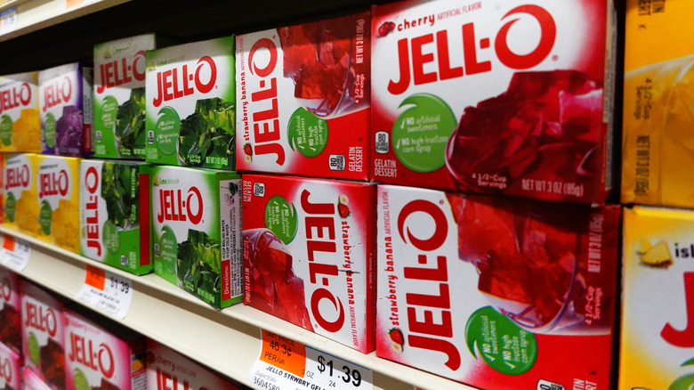 A variety of Jell-O boxes on grocery store shelves