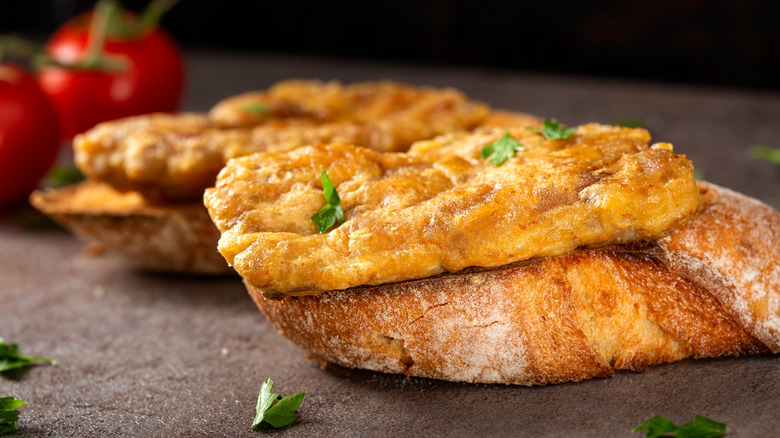 pork brain schnitzel on bread