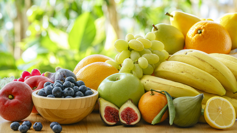 As assortment of fruit on a sunny table.