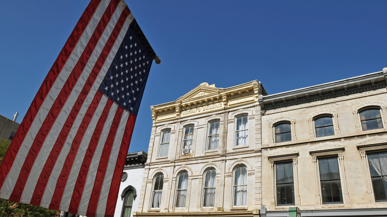 American flag in front of historic building