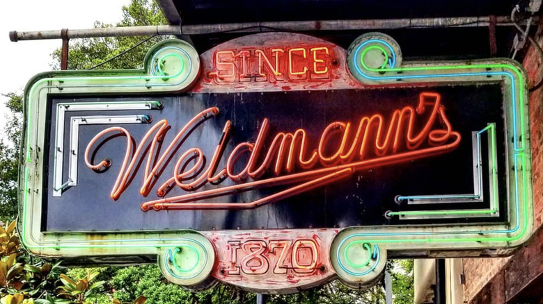 Weidmann's hanging neon sign