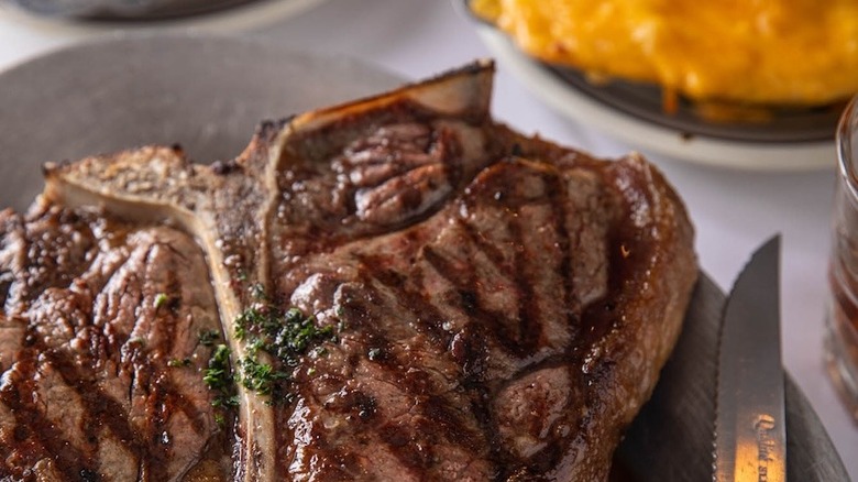 T-bone steak and sides at Charlie's Steak House