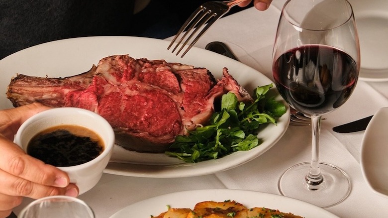 rare steak and wine at Gallagher's Steakhouse
