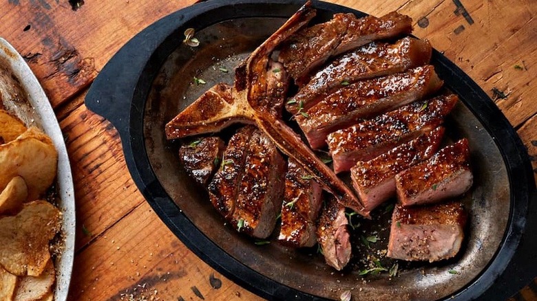 sliced T-bone at Jess and Jim's Steakhouse