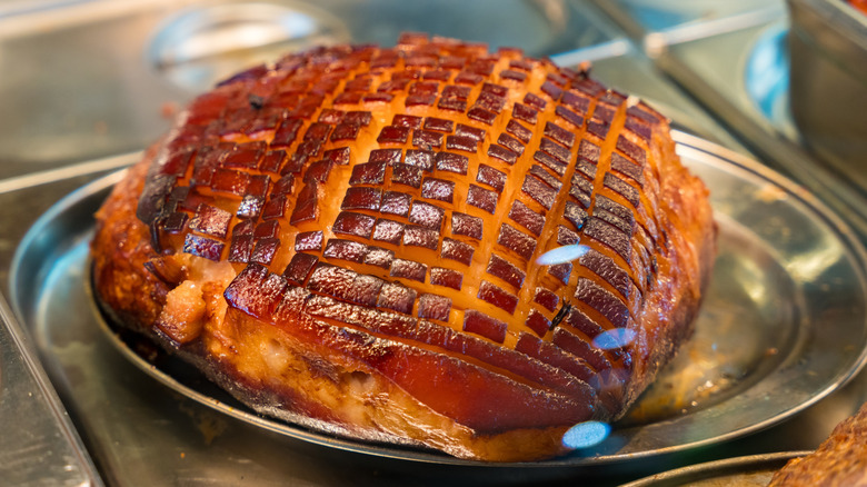 A scored, glazed ham