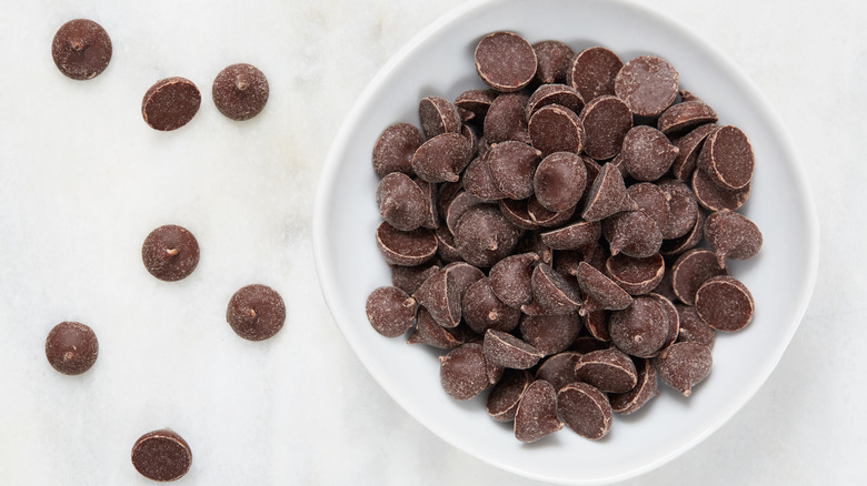 baking chocolate chips in white bowl