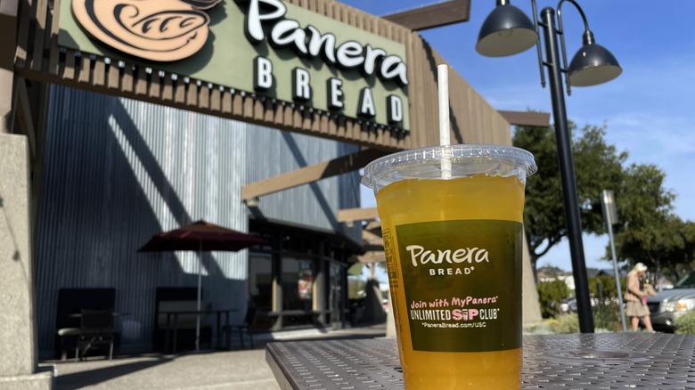 a Panera Bread mango yuzu citrus charged lemonade is displayed at a Panera Bread restaurant