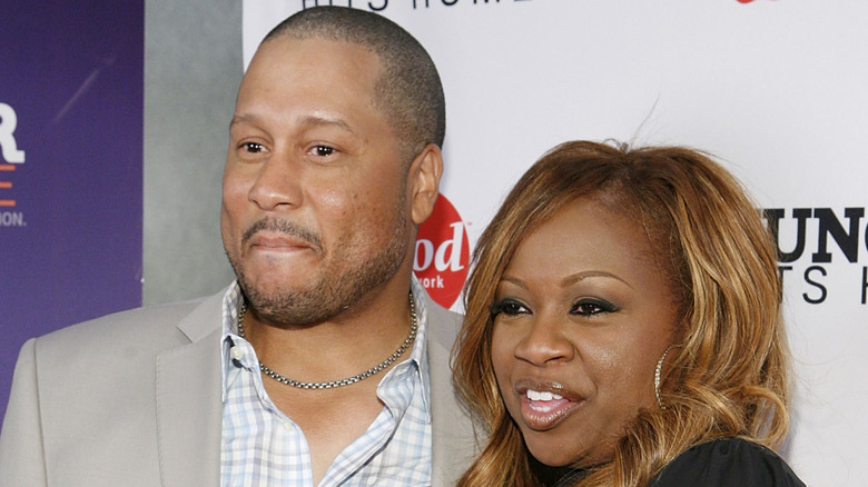 Pat and Gina Neely looking away from the camera at an event