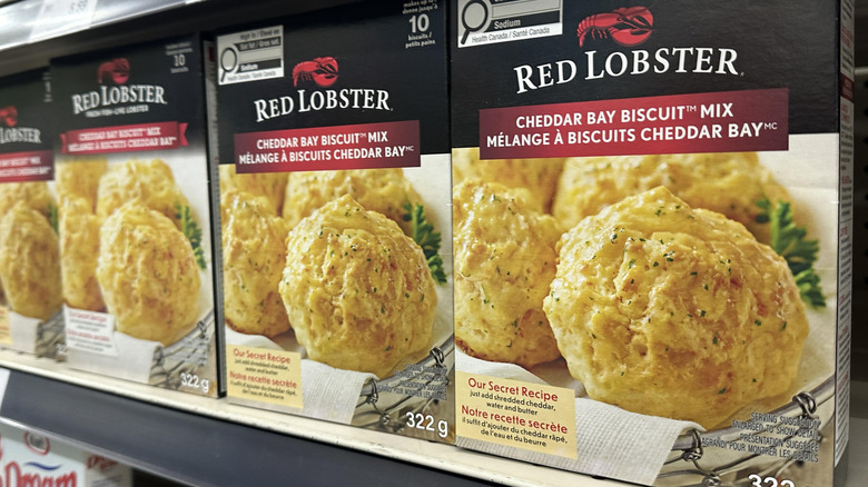 Packages of Red Lobster Cheddar Bay Biscuit mix on a supermarket shelf