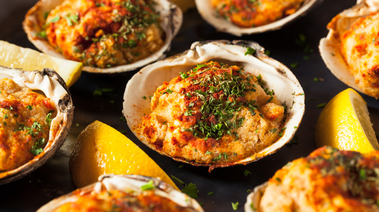 Baked clams with lemon and parsley.