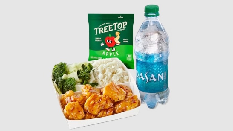 Panda Express Cub Meal featuring an entree, apple slices, and a bottle of water