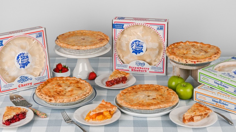 Assorted Village Piemaker pies on gingham tablecloth