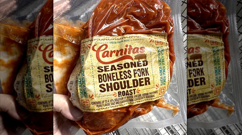 A package of Aldi carnitas-seasoned boneless pork shoulder roast