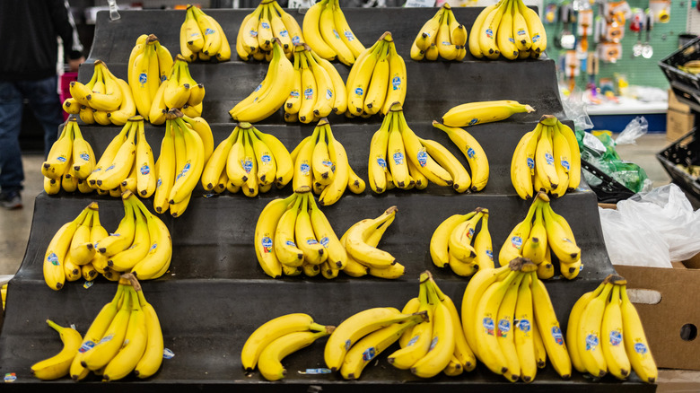 dwindling rows of chiquita bananas in the grocery store