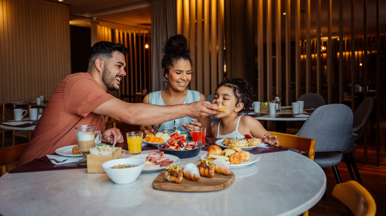 Family having breakfast in a hotel