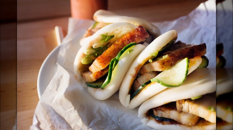 A plate of steamed pork buns from Momofuku