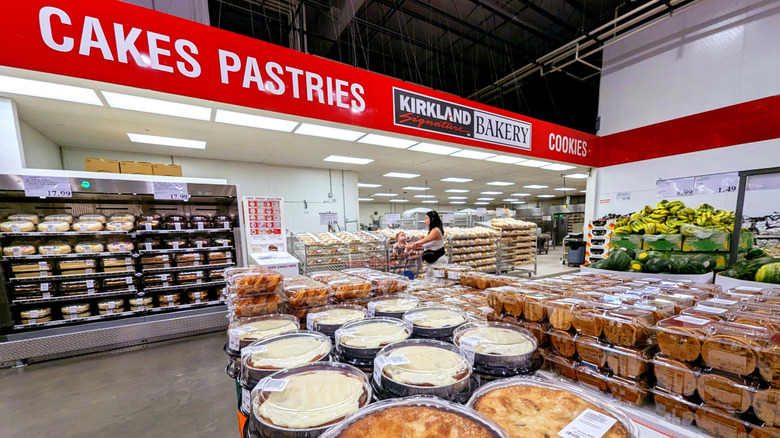 Costco Kirkland Signature bakery with pies and cookies piled up on a table.