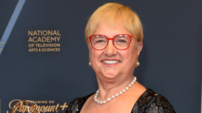 Lidia Bastianich in red glasses and pearl necklace