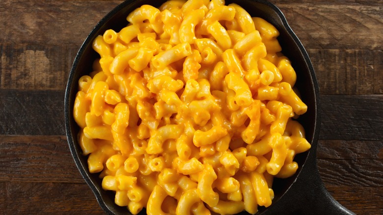 Macaroni and cheese in a skillet.