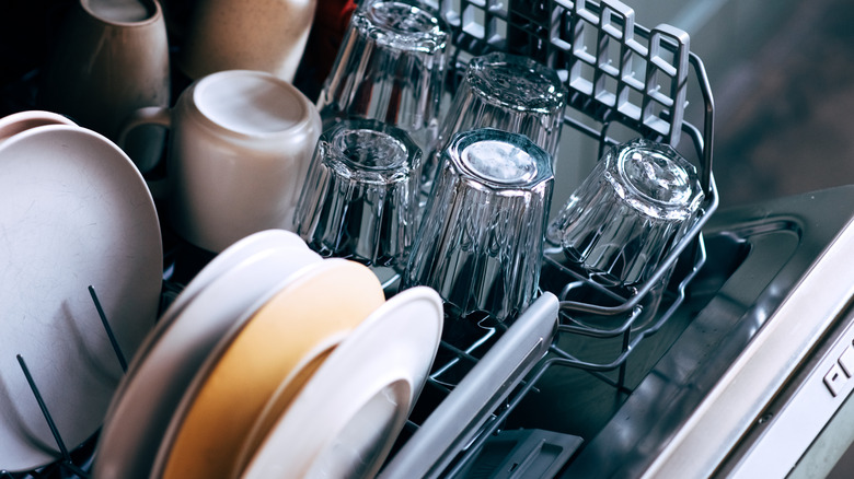 Close-up of dishes inside dishwasher
